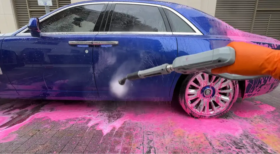 Professional auto detailing Richmond with foam rinse on a luxury vehicle in, VA